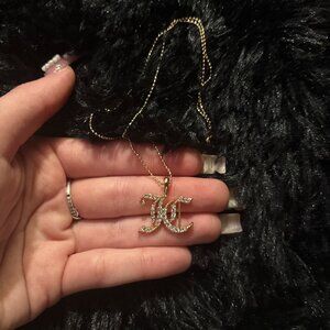 Juicy Couture gold necklace with rhinestone accents